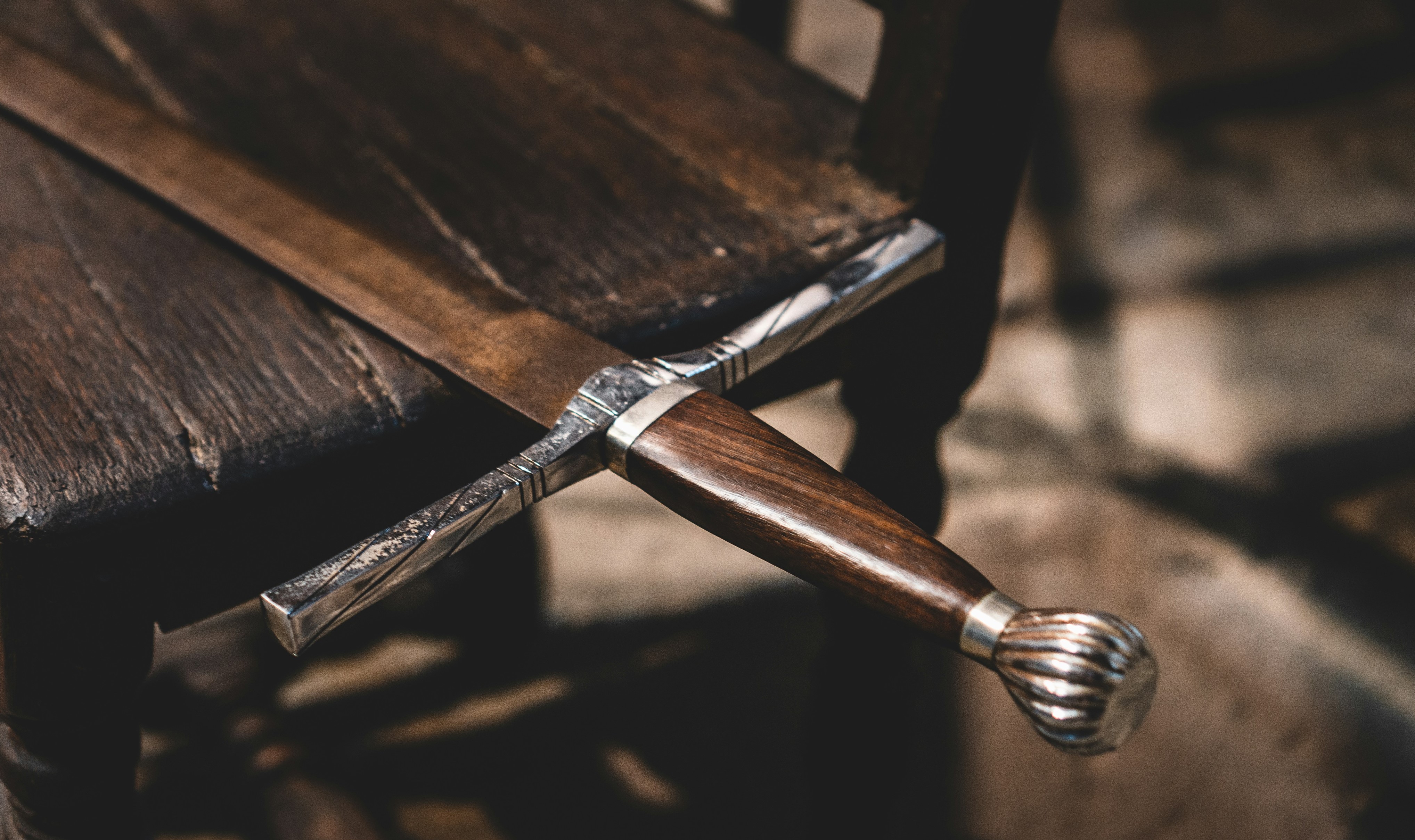 brown wooden handle bar on brown wooden table